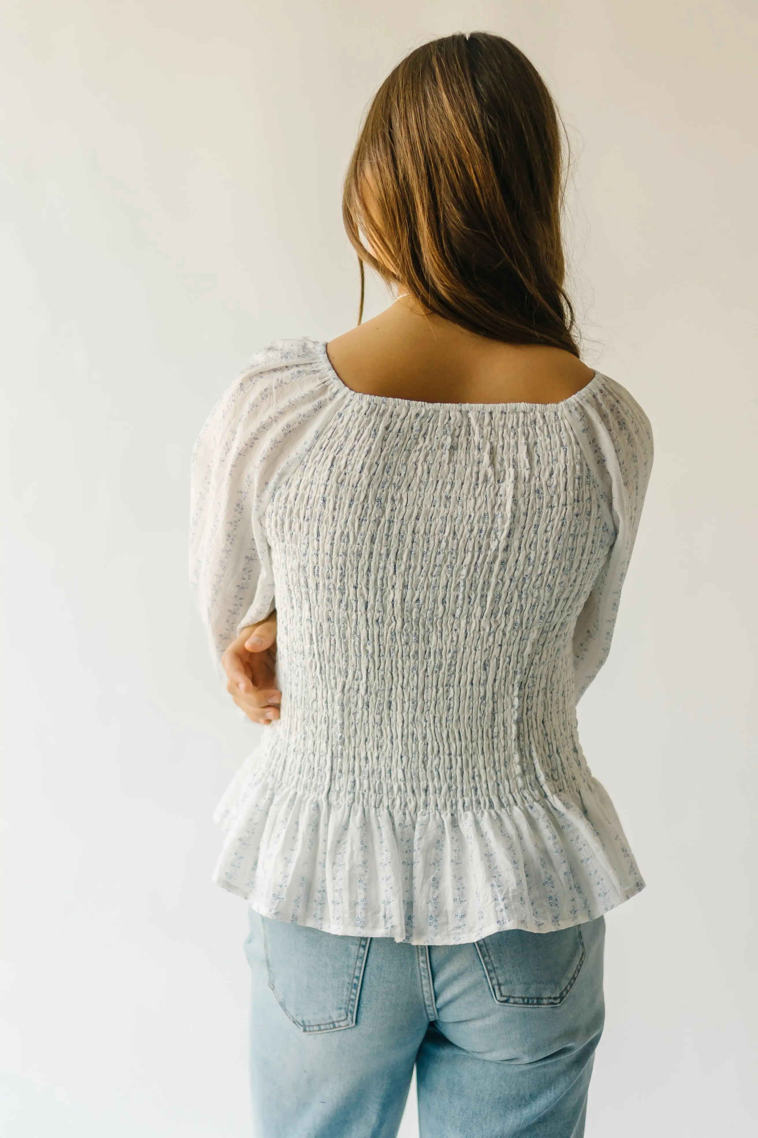 The Tamburro Smocked Detail Blouse in Ivory + Blue