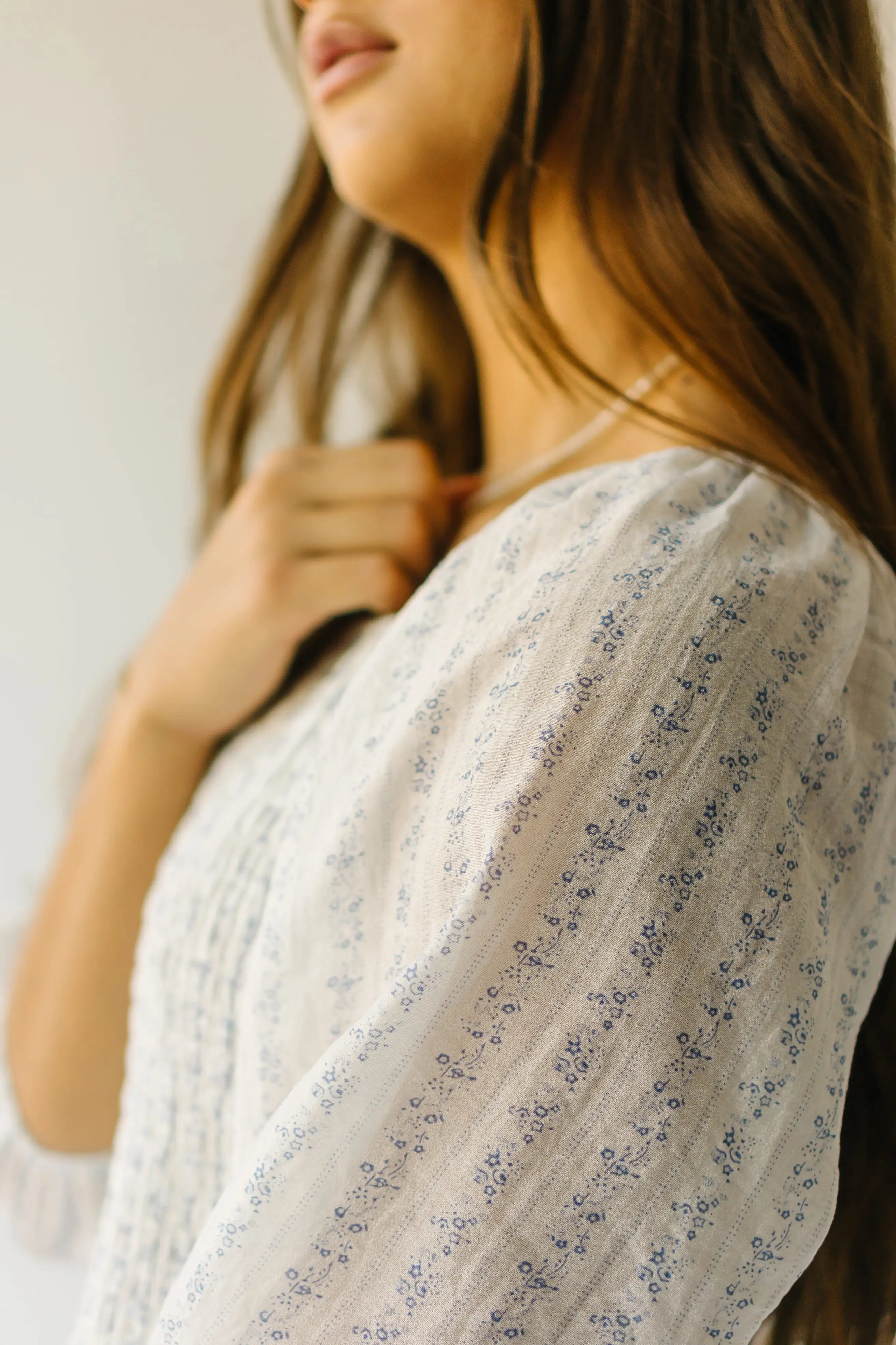 The Tamburro Smocked Detail Blouse in Ivory + Blue